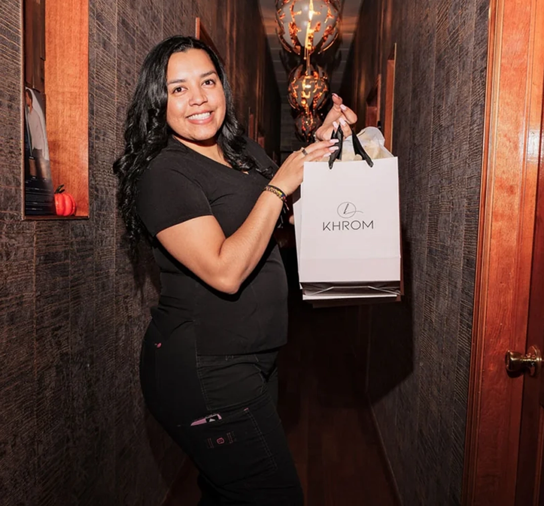 Smiling woman holding shopping bag